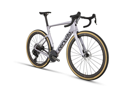 Side-rear angle of white Cervelo Aspero-5 SRAM Force AXS 1 Gravel Bike, emphasizing deep-section wheels and sleek geometry.