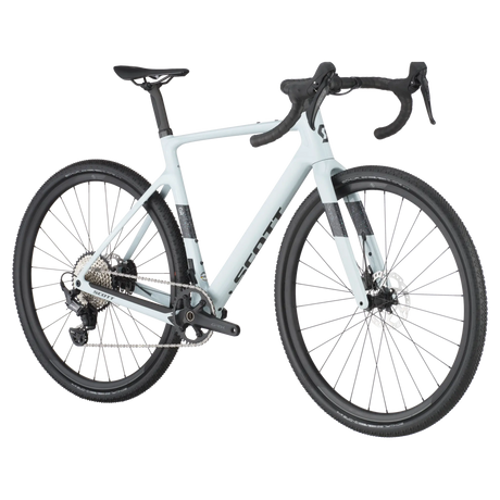 Scott Addict Gravel 40 light blue gravel bike with durable tires, aerodynamic frame, and Shimano drivetrain for optimal off-road performance.
