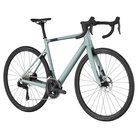 Angled view of the Scott Addict 40 Road Bike in metallic green, highlighting its aerodynamic geometry, carbon frame, and high-performance components.