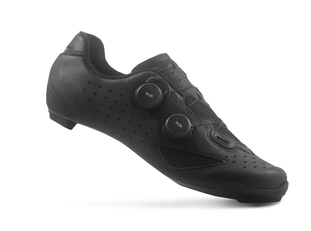 Black cycling shoe on a white background