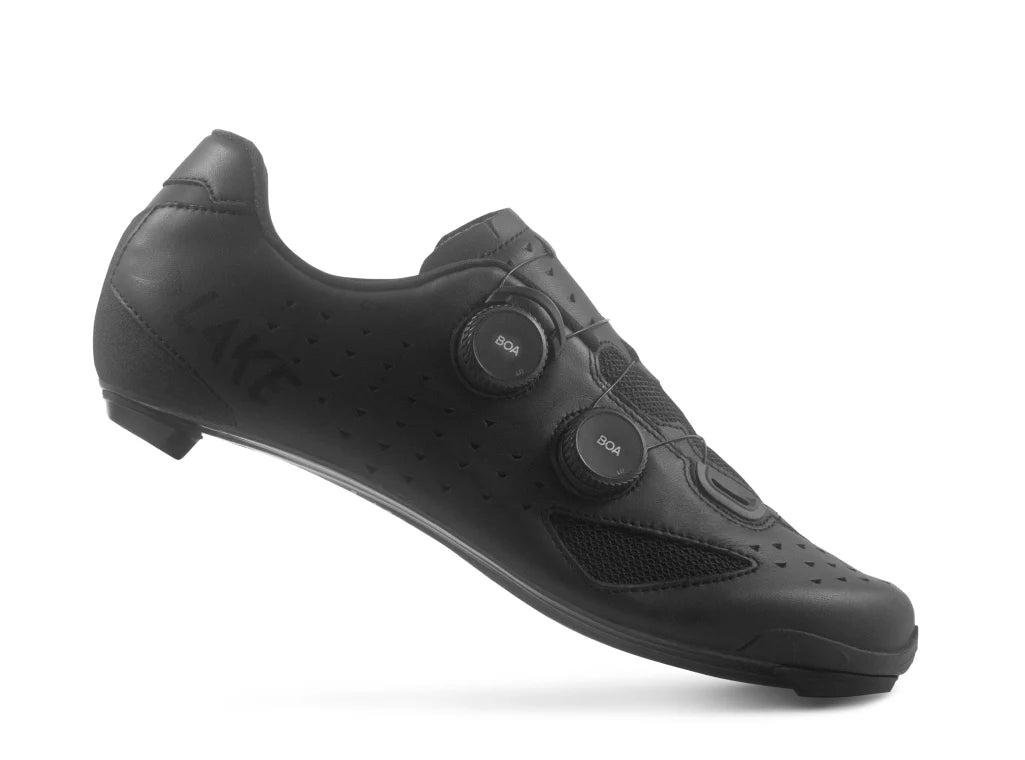 Black cycling shoe on a white background