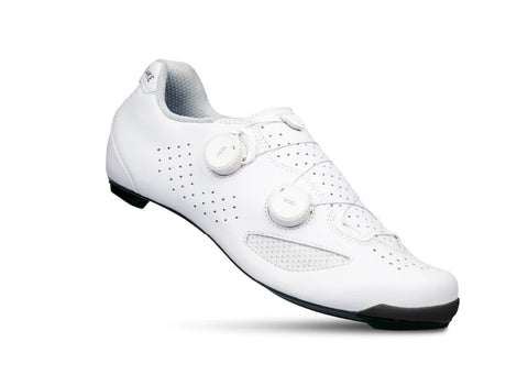 White cycling shoe with black sole on a white background