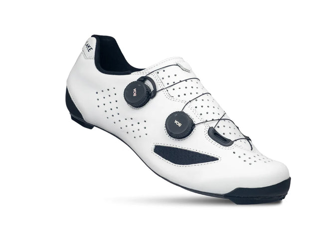 White cycling shoe with black accents on a white background