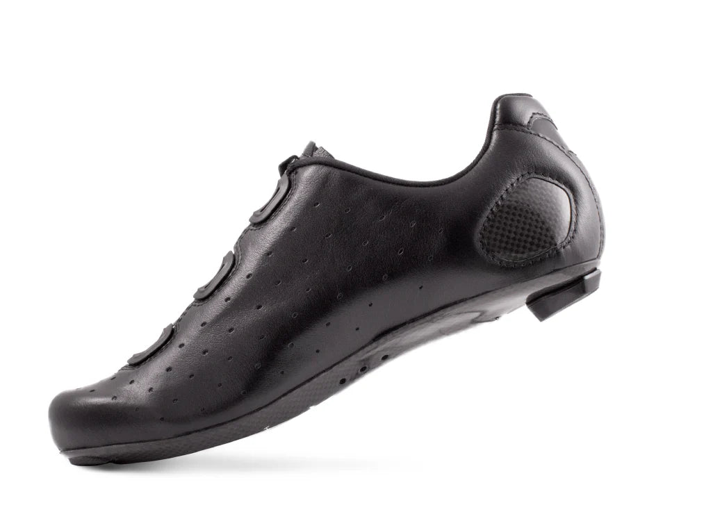 Black cycling shoe on a white background