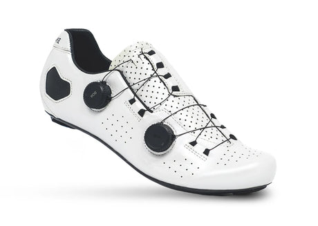 White cycling shoe with black accents on a white background