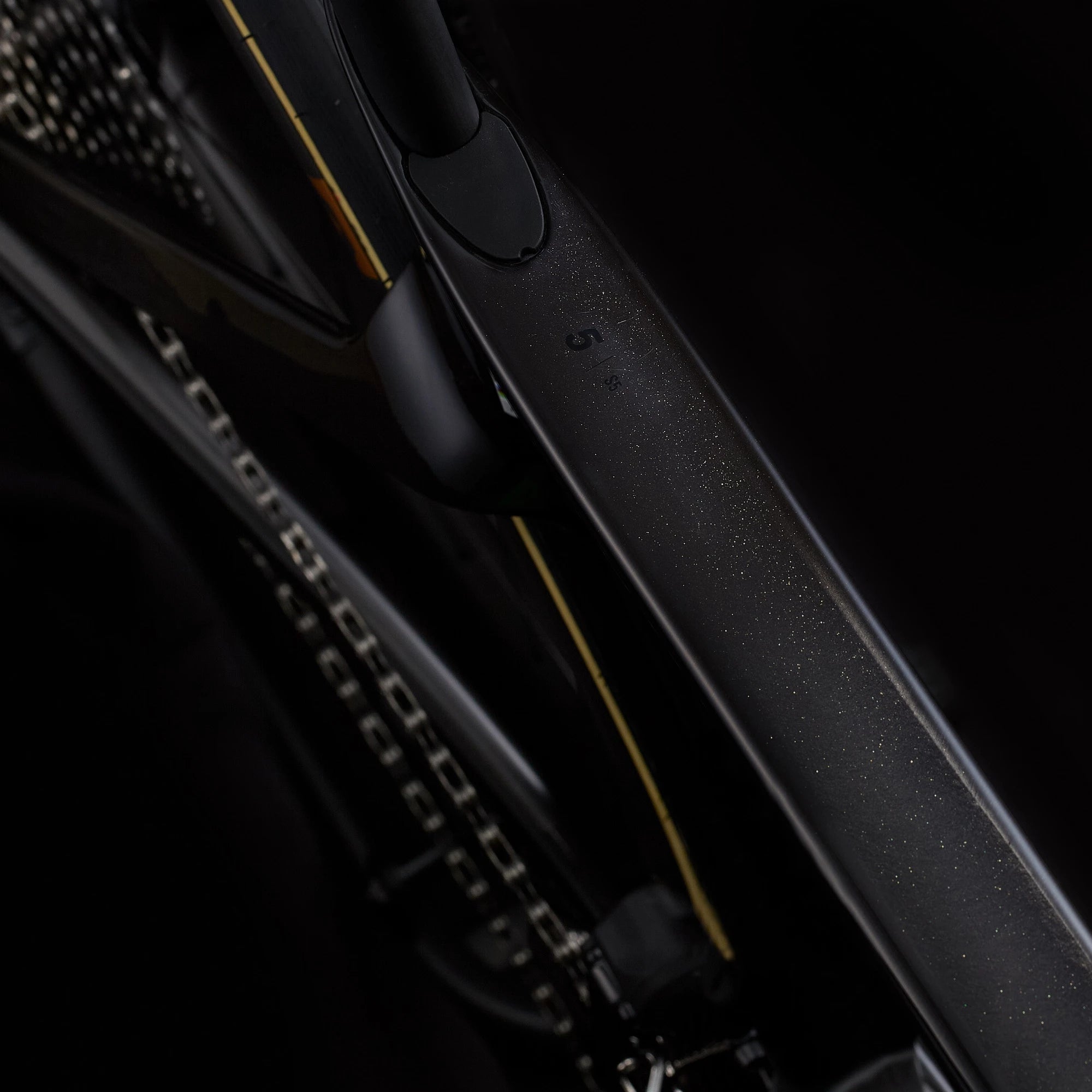 Top tube view of black Cervélo S5 Dura-Ace Di2 Road Bike showing sleek carbon finish and internal cable routing for aerodynamic efficiency.