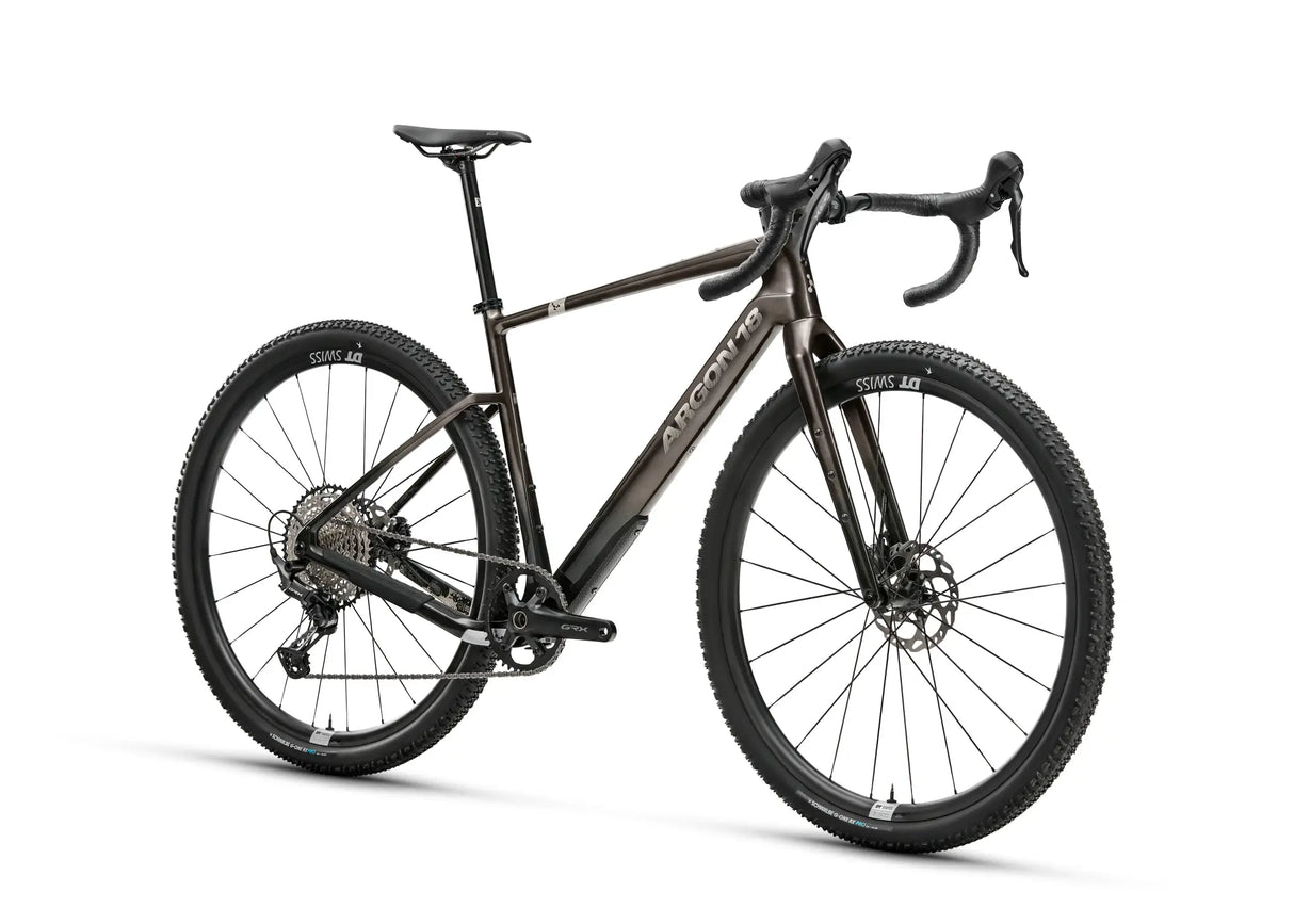 Side angle of Argon 18 Dark Matter GRX RX822 (1x) Gravel Bike in matte black, showcasing its aerodynamic frame and off-road tire setup.