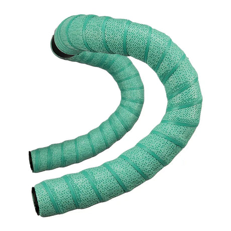 A close-up of a bicycle handlebar wrapped in Lizard Skins DSP V2 2.5mm Bar Tape, featuring a textured, turquoise design. This durable tape has a crisscross pattern that covers the curved sections of the handlebar, delivering a comfortable and stylish grip.