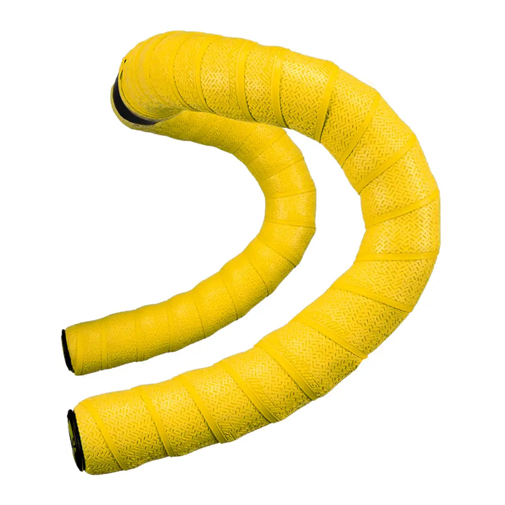 The Lizard Skins DSP V2 2.5mm Bar Tape, shown in yellow and coiled in a spiral shape against a white background, is designed with a textured surface to enhance grip.