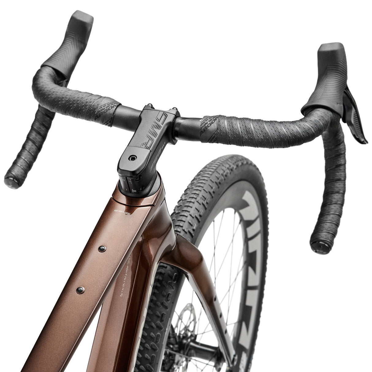 Handlebar and front frame detail of Argon 18 Dark Matter Force XPLR AXS Gravel Bike showcasing ergonomic grip and control.