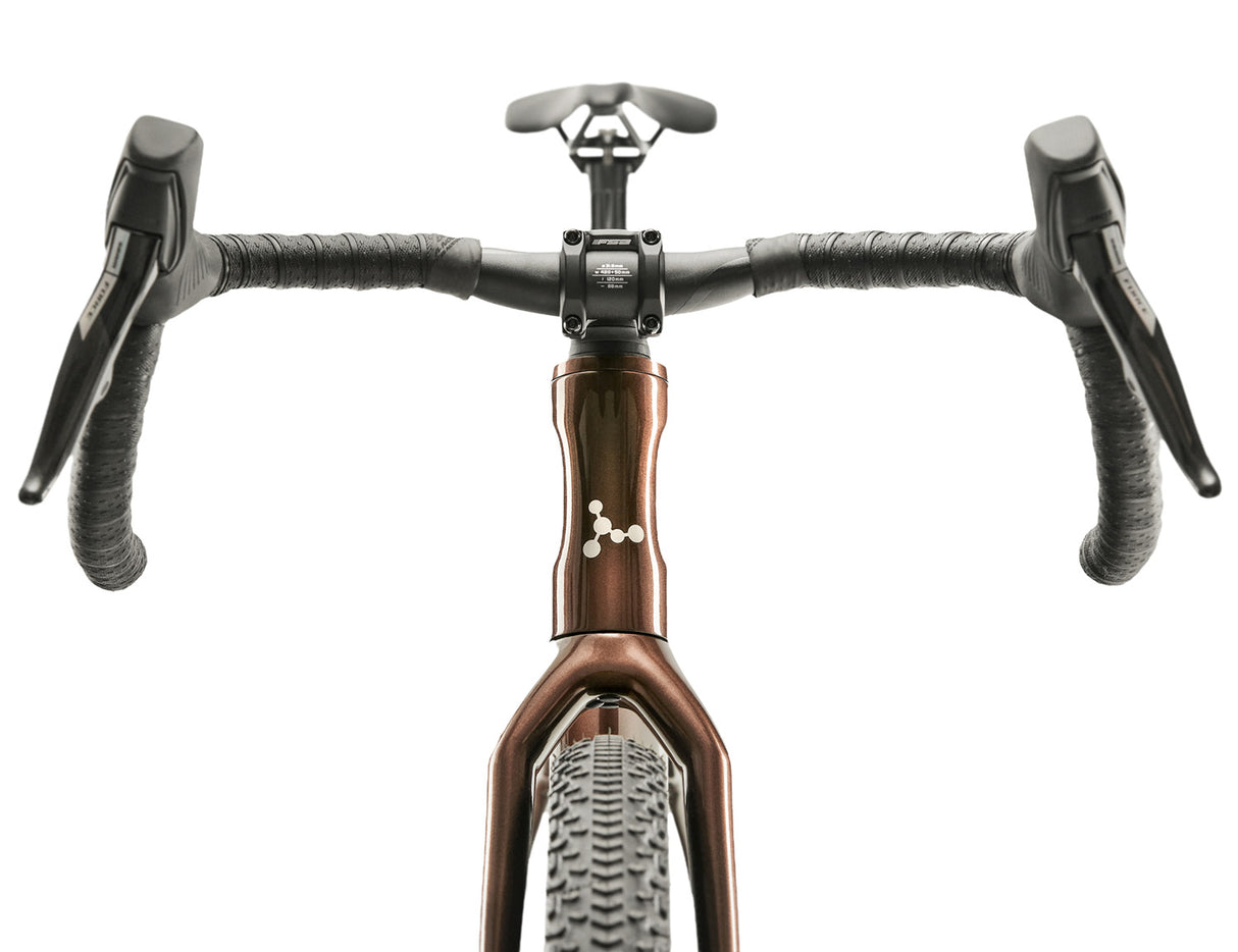 Front view of Argon 18 Dark Matter Force XPLR AXS Gravel Bike highlighting drop handlebars and integrated cockpit setup.