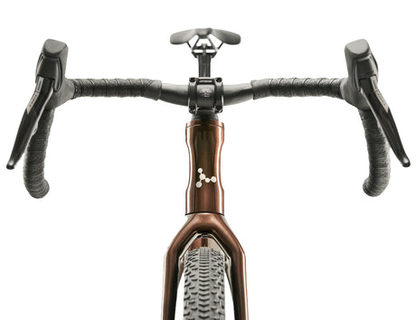 Front view of Argon 18 Dark Matter Force XPLR AXS Gravel Bike highlighting drop handlebars and integrated cockpit setup.