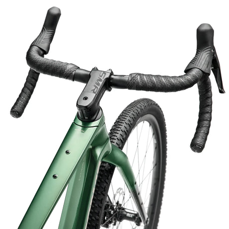 Close-up of the handlebar and cockpit of Argon 18 Dark Matter GRX RX822 (1x) Gravel Bike, featuring ergonomic drop bars and integrated controls.