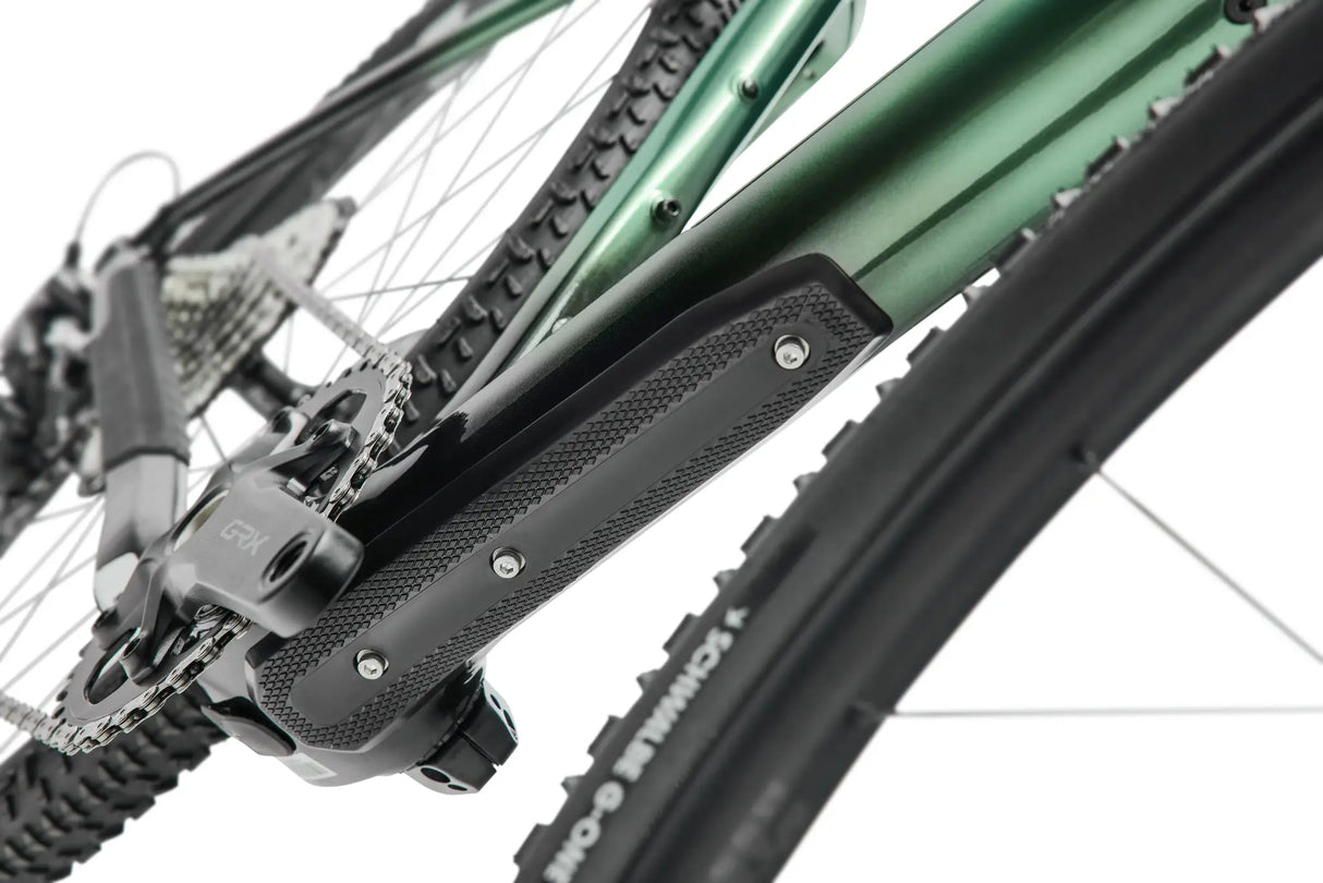 Detail of the chainstay protector and drivetrain area on the Argon 18 Dark Matter GRX RX822 (1x) Gravel Bike, built for durability on rough trails.