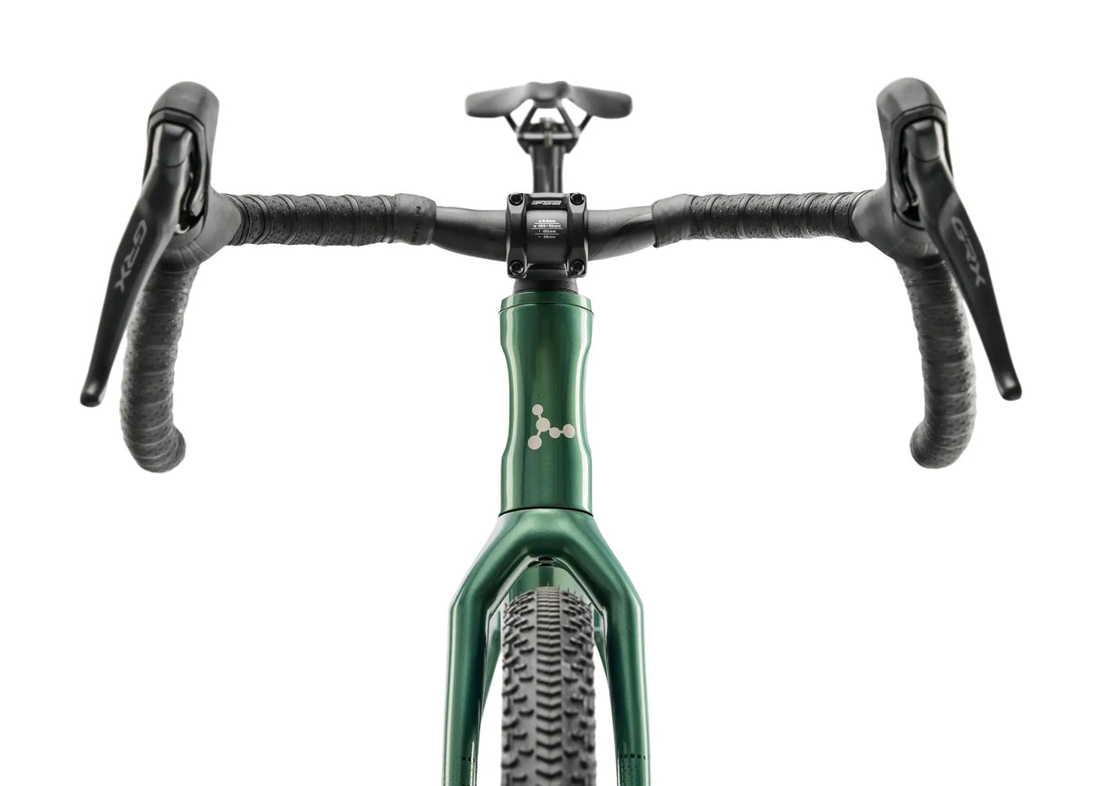 Front cockpit view of Argon 18 Dark Matter GRX RX822 (1x) Gravel Bike, showing dual GRX shifters and wide tire profile for gravel riding.