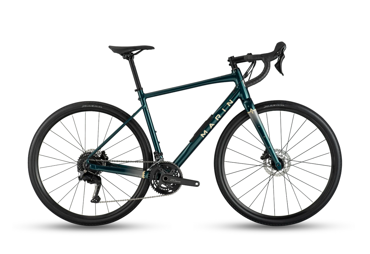Marin Gestalt 1 gravel bike in metallic teal green, full side view on a white studio background
