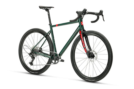 Angled view of Argon 18 Grey Matter Apex XPLR Gravel Bike highlighting its aerodynamic design, drop handlebars, and rugged tires for trail riding.