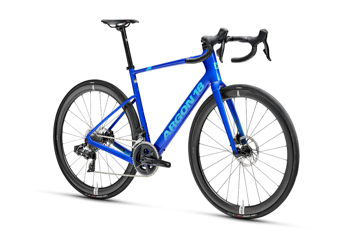 Blue bicycle with black components on a white background
