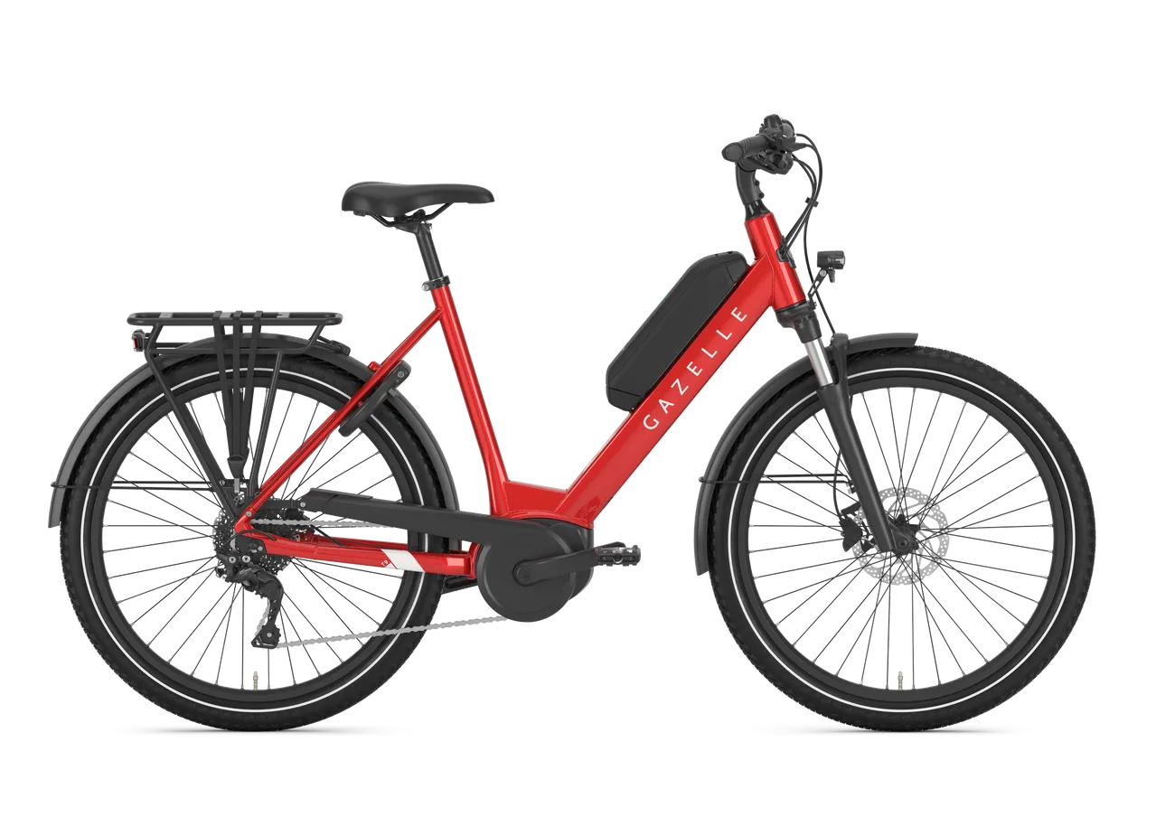 Gazelle Medeo T9 HMB Low Step Hybrid E-Bike in vibrant red, designed for effortless urban mobility and outdoor recreation cycling.