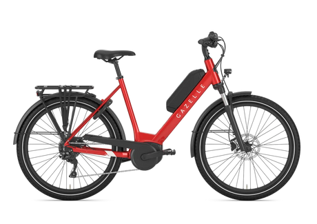 Gazelle Medeo T9 HMB Low Step Hybrid E-Bike in vibrant red, designed for effortless urban mobility and outdoor recreation cycling.