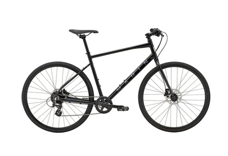 Marin Presidio 1 Gravel Bike in matte black with flat handlebars and disc brakes, ideal for urban commuting and hybrid cycling performance.