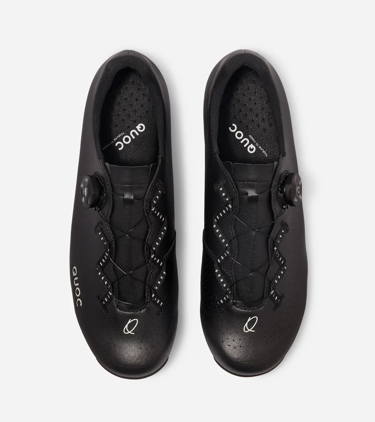 Top view of QUOC Escape Off-Road Shoe in black, highlighting ergonomic design and zigzag lace system for secure fit.