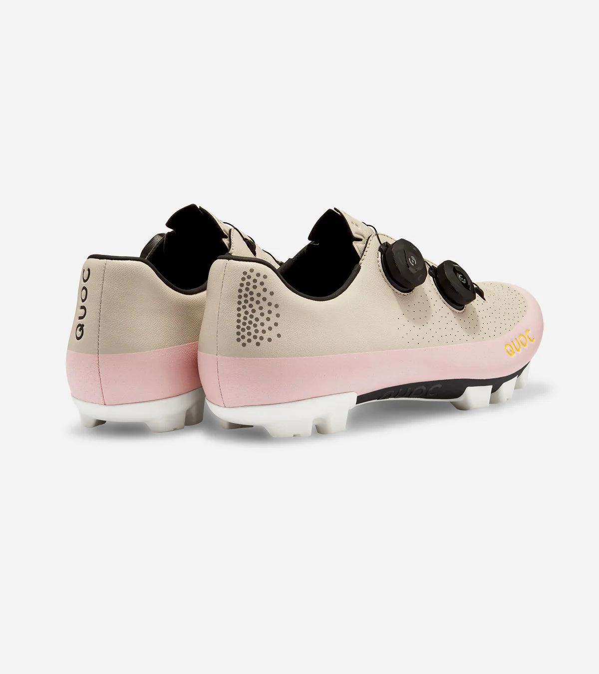 Rear view of QUOC Gran Tourer XC Off-Road Shoes in sand and pink, featuring heel ventilation and ergonomic structure for comfort.