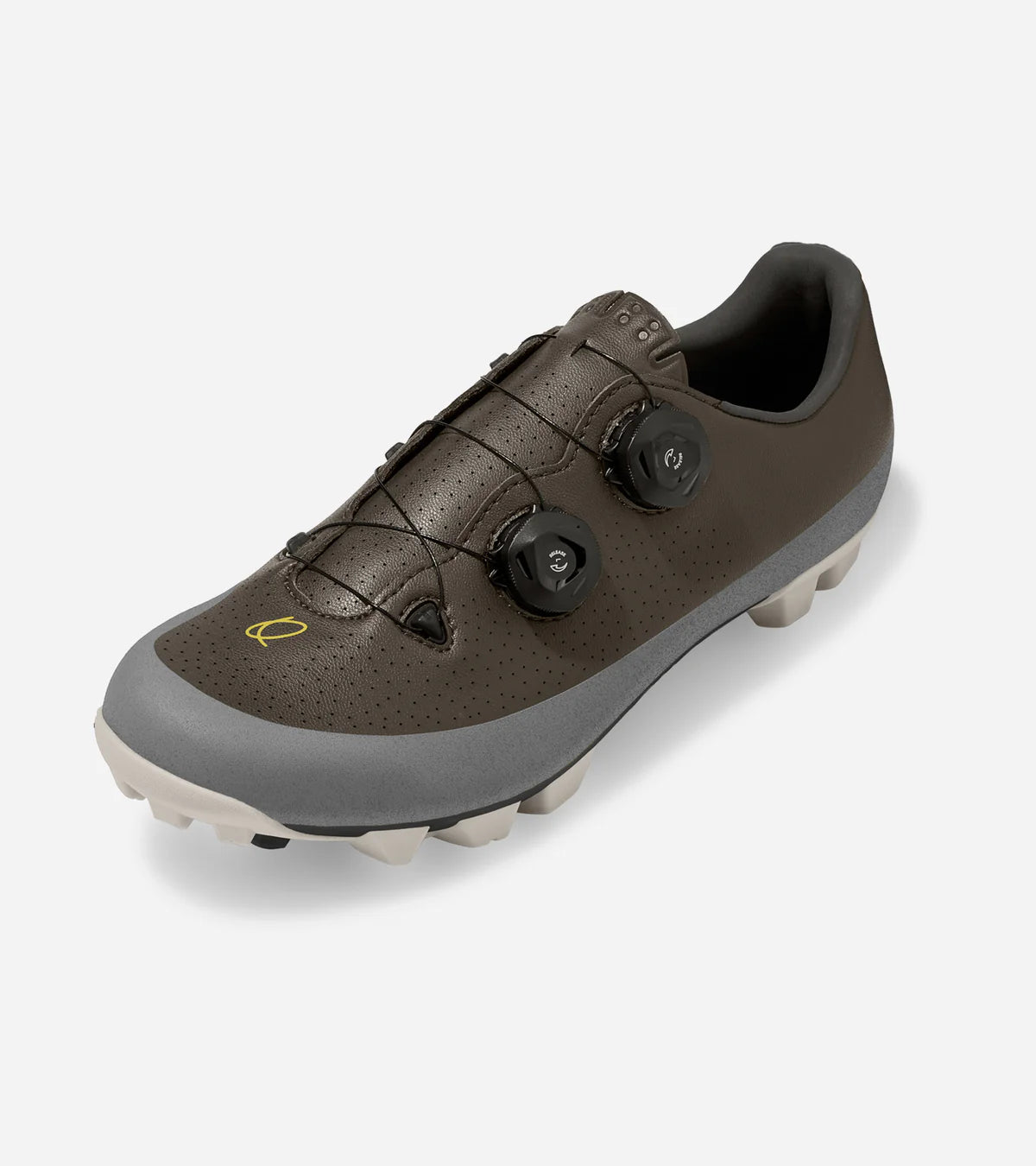 Angled view of QUOC Gran Tourer XC Off-Road Shoe in brown and grey, designed for stiffness, comfort, and trail-ready performance.