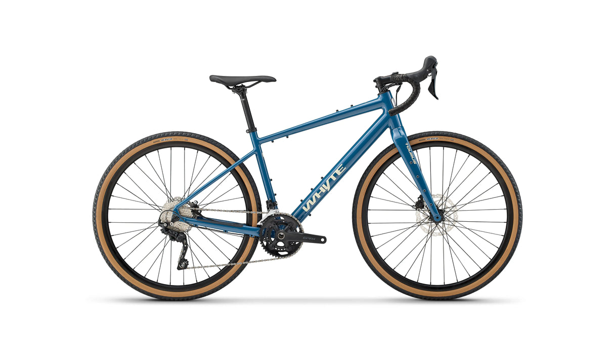 Whyte Tourus Gravel Bike in blue with lightweight frame and wide tires, designed for touring, commuting, and gravel exploration.