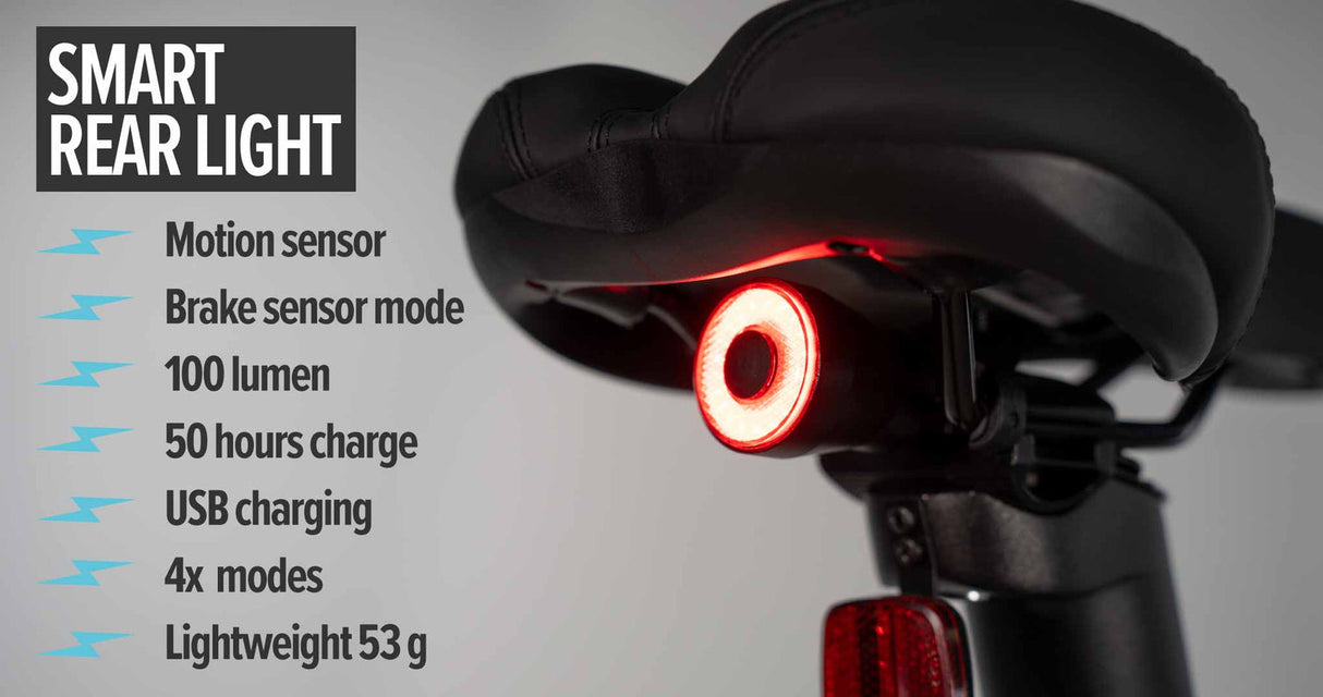 Close-up of smart rear light on estarli E20.7 Comfort Hybrid E-Bike, featuring motion sensor, USB charging, and 100 lumen brightness.