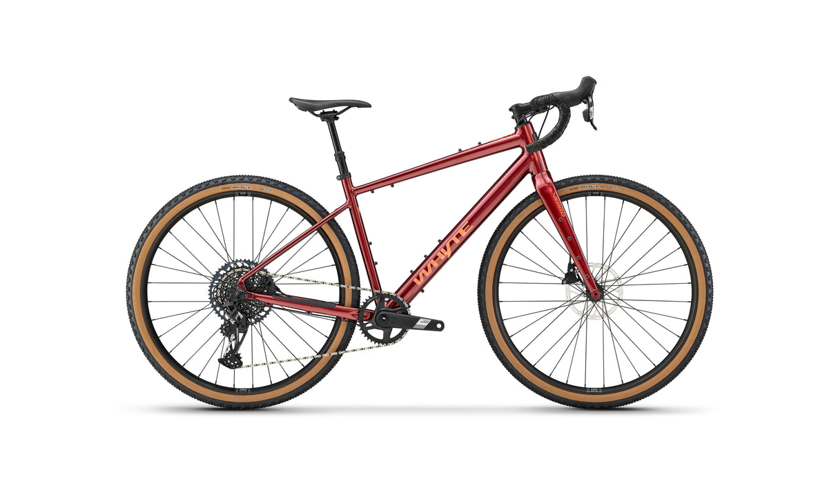 Whyte Verro Gravel Bike in red with tan wall tires, designed for rugged terrain and long-distance cycling adventures.