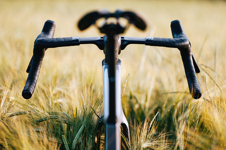 Frontal view of Cervelo Aspero-5 SRAM Force AXS 1 Gravel Bike handlebars and stem, emphasizing aerodynamic integration.