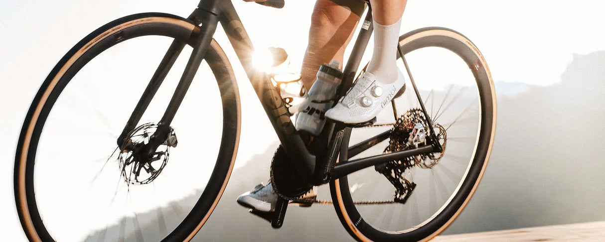 Person riding a bicycle with a blurred background