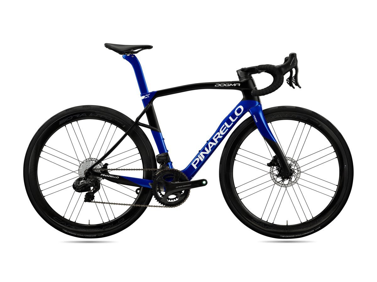Pinarello Dogma X Endurance Road Bike in deep blue and black colorway, built for long-distance comfort and speed. Shop now at Billy Bilsland Cycles.