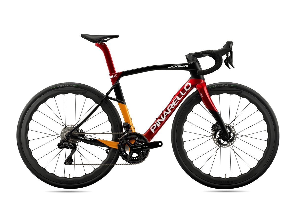 Pinarello Dogma X Endurance Road Bike in red, orange, and black gradient, optimized for endurance and performance. Available at Billy Bilsland Cycles.