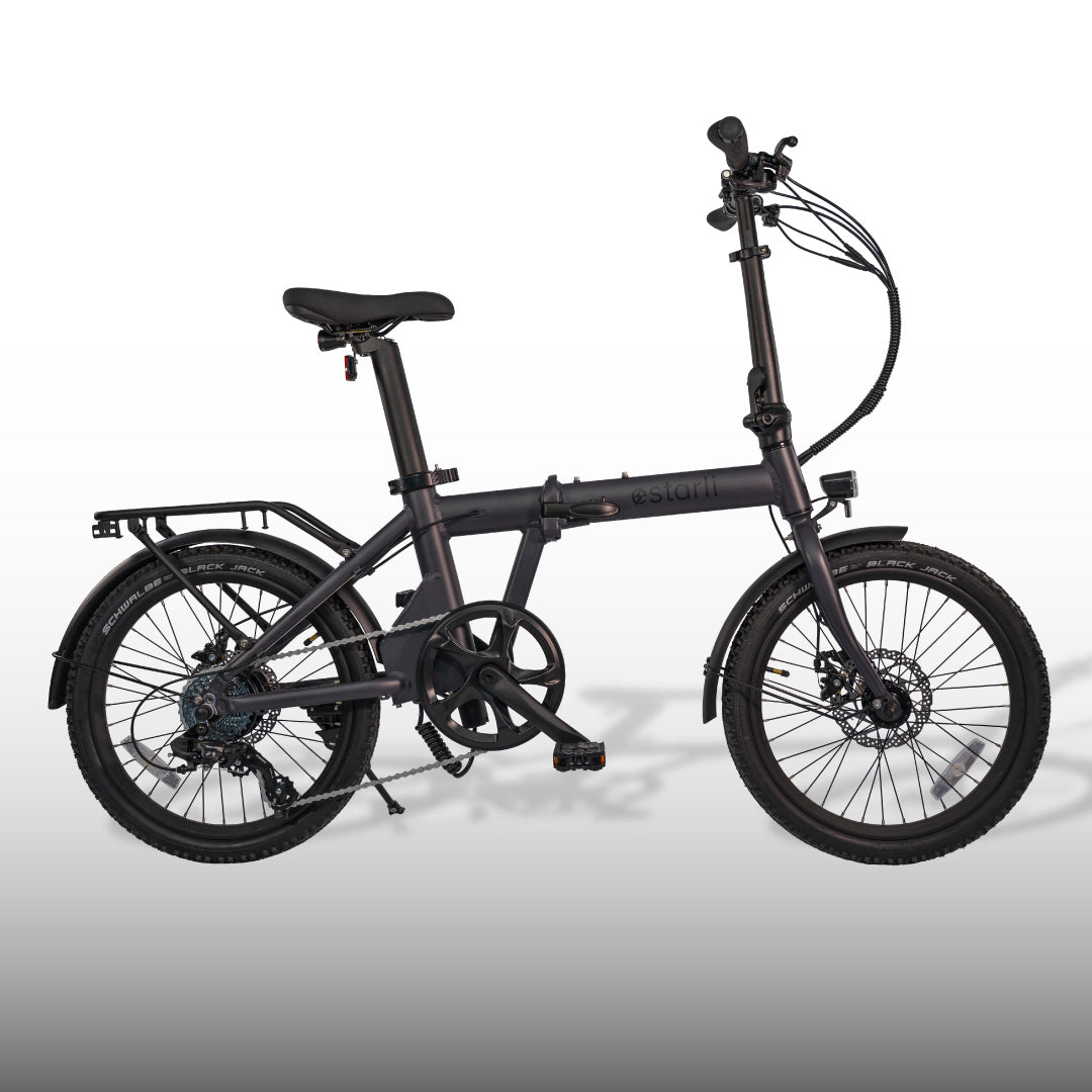 Matte black estarli E20.7 Comfort Hybrid E-Bike with disc brakes and rear rack, built for comfort and performance in urban settings.