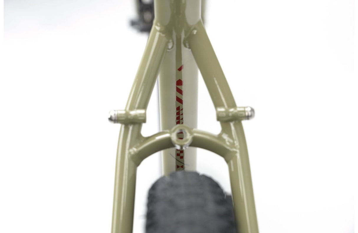 Rear triangle of the 2025 Genesis Croix De Fer 30 Gravel Bike showing tire clearance and mounting points for racks or fenders.