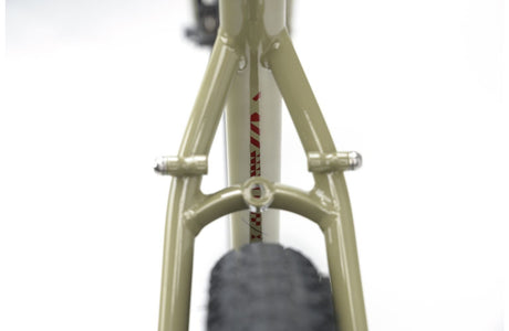 Rear triangle of the 2025 Genesis Croix De Fer 30 Gravel Bike showing tire clearance and mounting points for racks or fenders.
