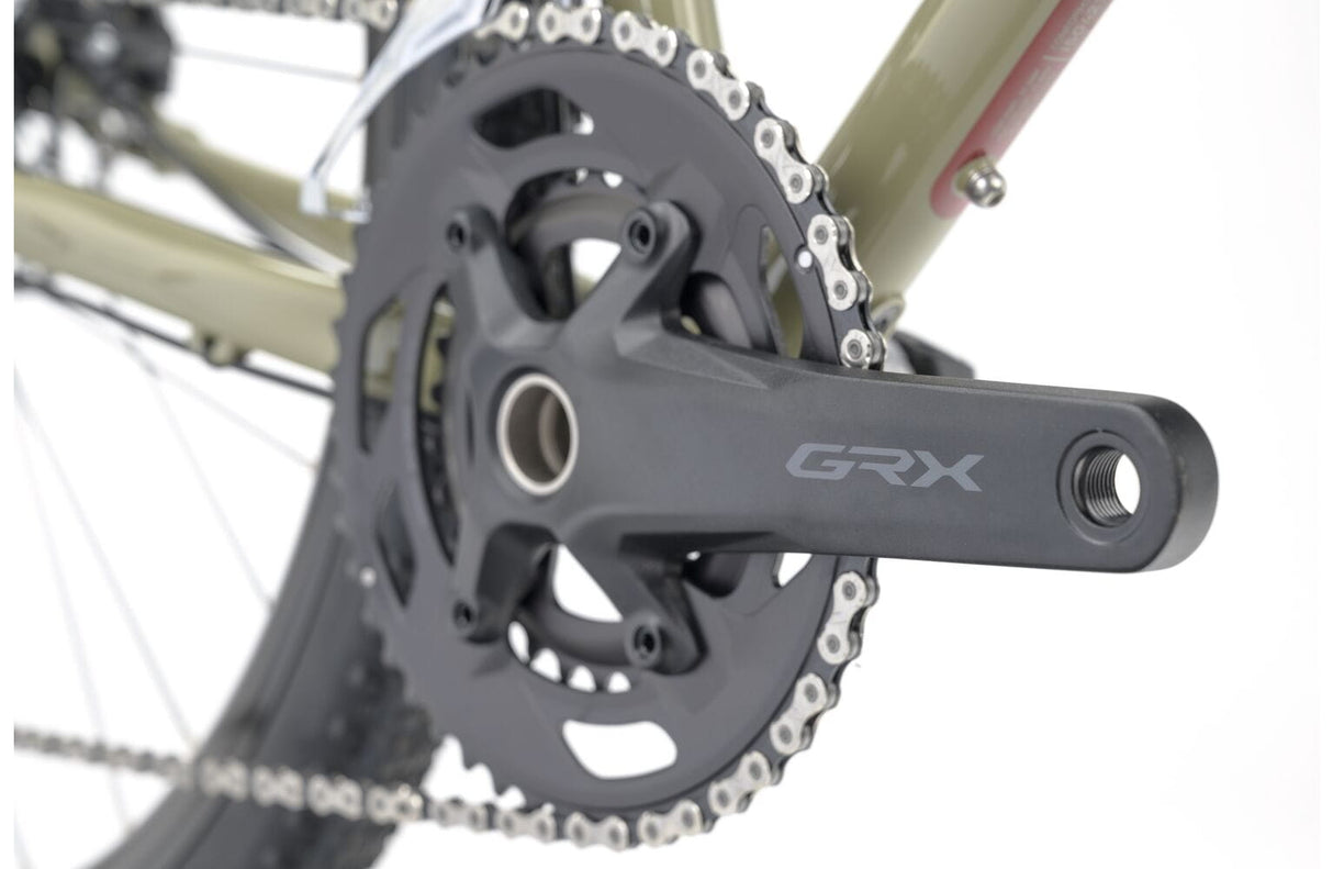 Shimano GRX crankset on the 2025 Genesis Croix De Fer 30 Gravel Bike, engineered for durability and smooth power transfer on trails.