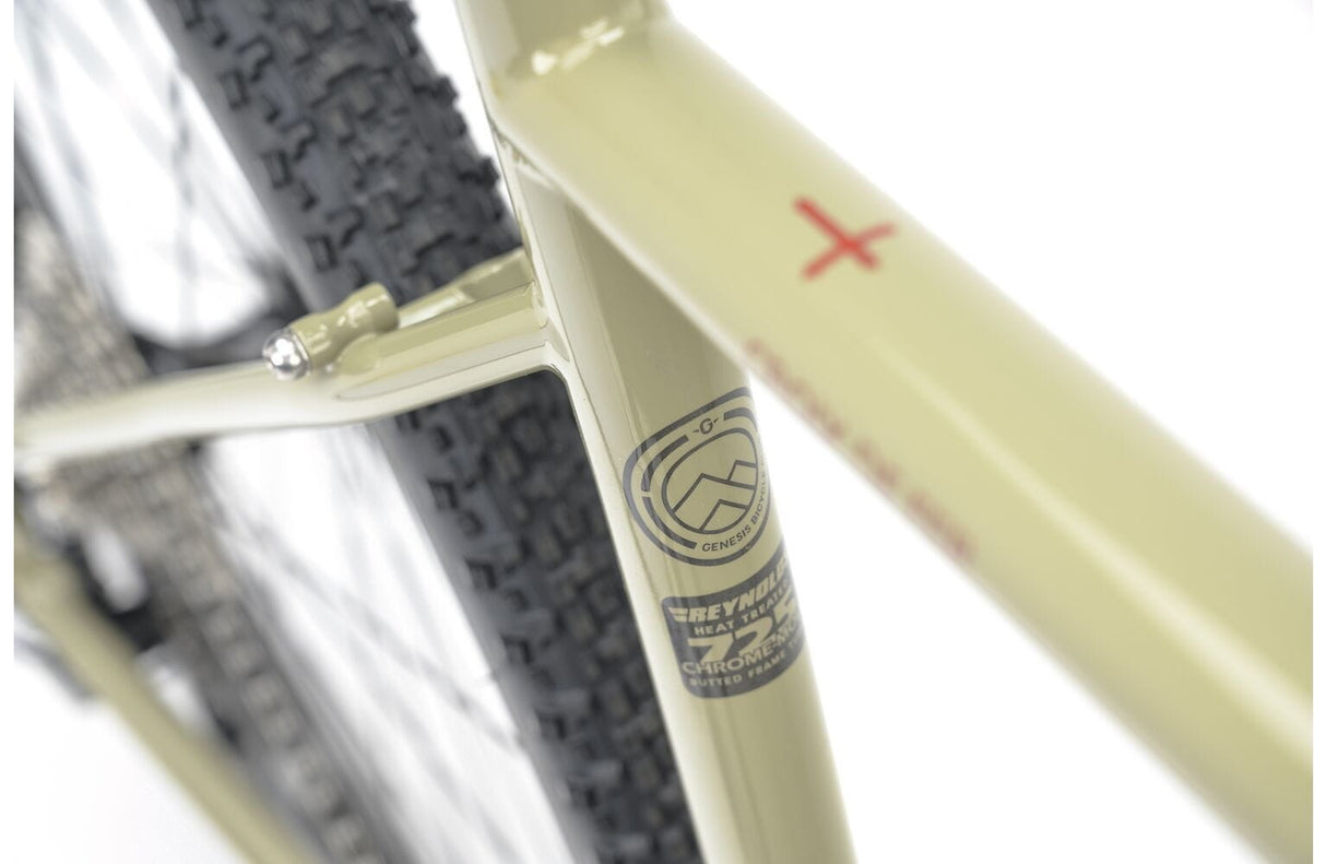 Top tube detail of the 2025 Genesis Croix De Fer 30 Gravel Bike with Reynolds 725 tubing and precision welds for strength and comfort.