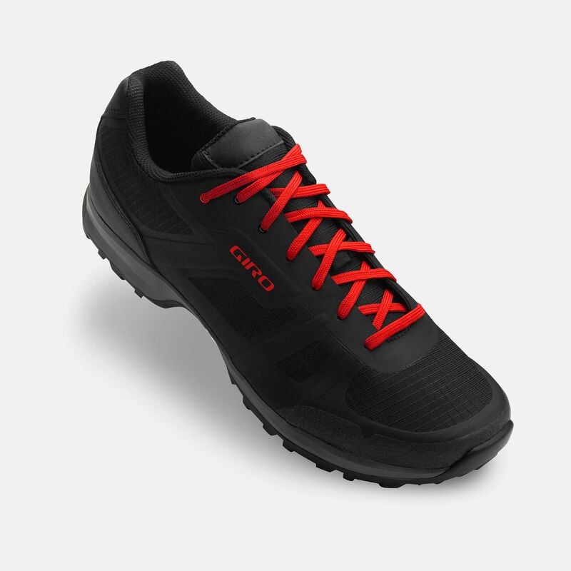 Close-up of Giro Gauge MTB Shoe showcasing breathable mesh upper and red laces, designed for comfort and power transfer on off-road rides.