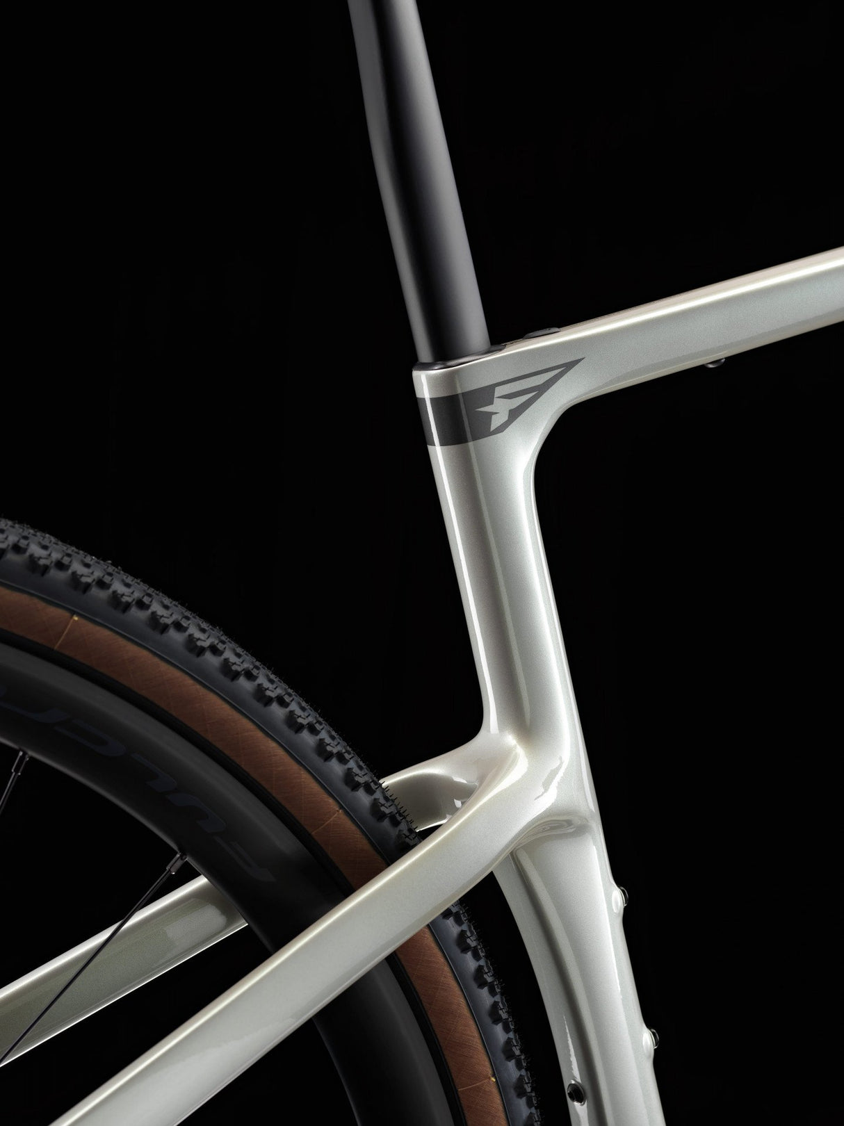 Close-up of a bicycle frame with a dark background