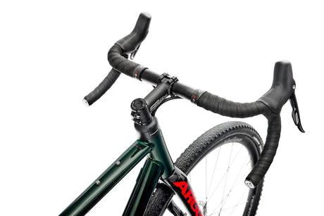 Top-down view of Argon 18 Grey Matter Apex XPLR Gravel Bike handlebars and stem, emphasizing ergonomic design and control features.