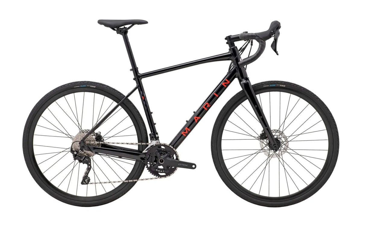 Marin Gestalt 2 Gravel Bike in matte black with red branding, featuring drop handlebars and disc brakes for versatile road and trail riding.