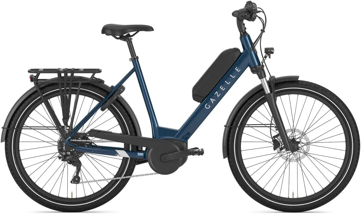 Gazelle Medeo T9 HMB Low Step Hybrid E-Bike in navy blue with step-through frame, ideal for urban commuting and outdoor cycling adventures.