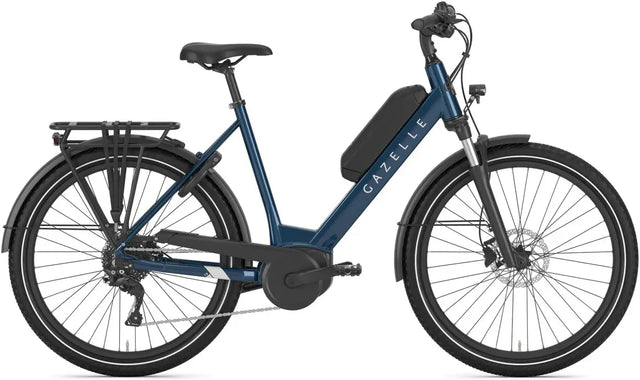Gazelle Medeo T9 HMB Low Step Hybrid E-Bike in navy blue with step-through frame, ideal for urban commuting and outdoor cycling adventures.