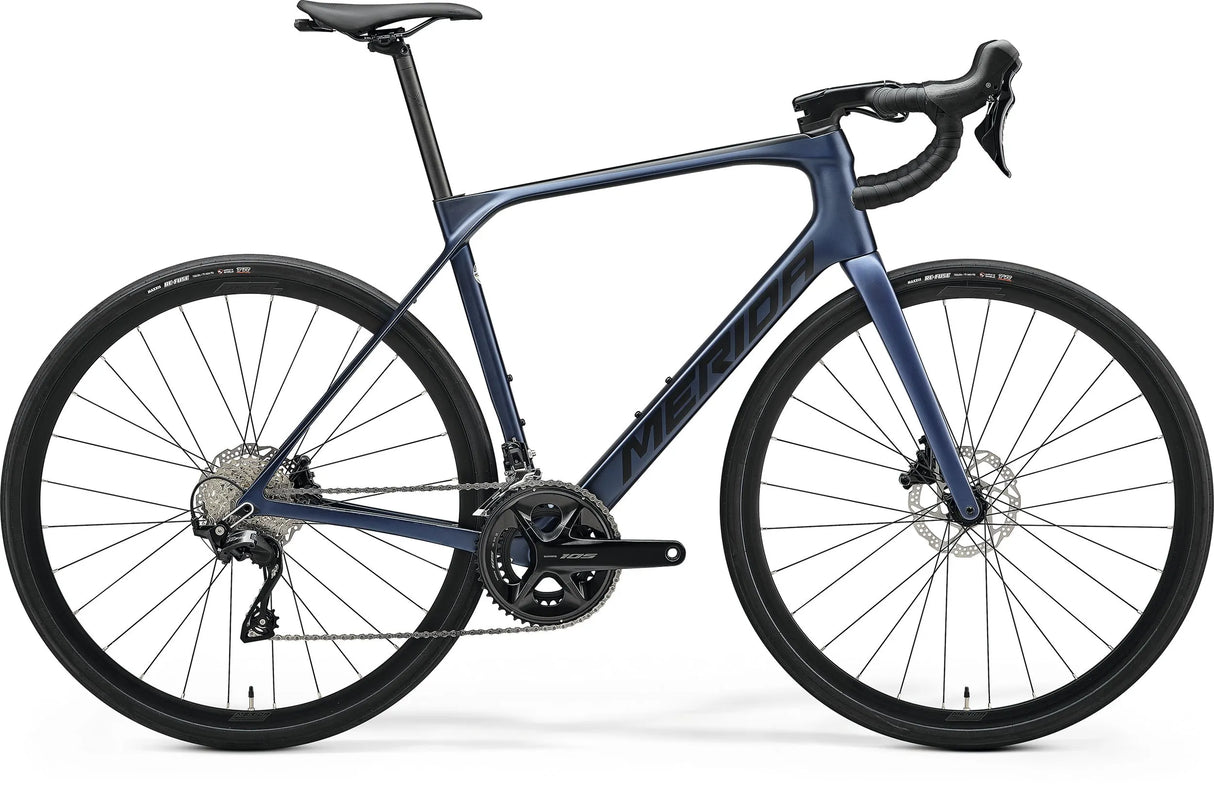 Merida Scultura Endurance 4000 Road Bike in sleek blue finish, featuring a lightweight carbon frame, Shimano drivetrain, and disc brakes for superior performance.