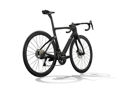 Rear angled view of the Pinarello F7 Ultegra Di2 road bike in matte black, emphasizing its aerodynamic tubing and advanced drivetrain.