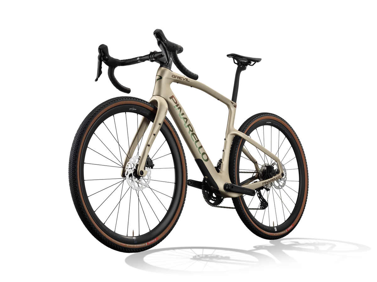 Altai Dust Pinarello Grevil F1 gravel bike from a front three-quarter angle, non-drive side.