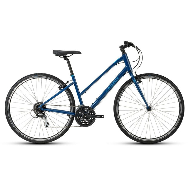 Ridgeback Velocity Open Frame Hybrid Bike in blue with step-through frame, ideal for urban commuting and recreational cycling on city roads.